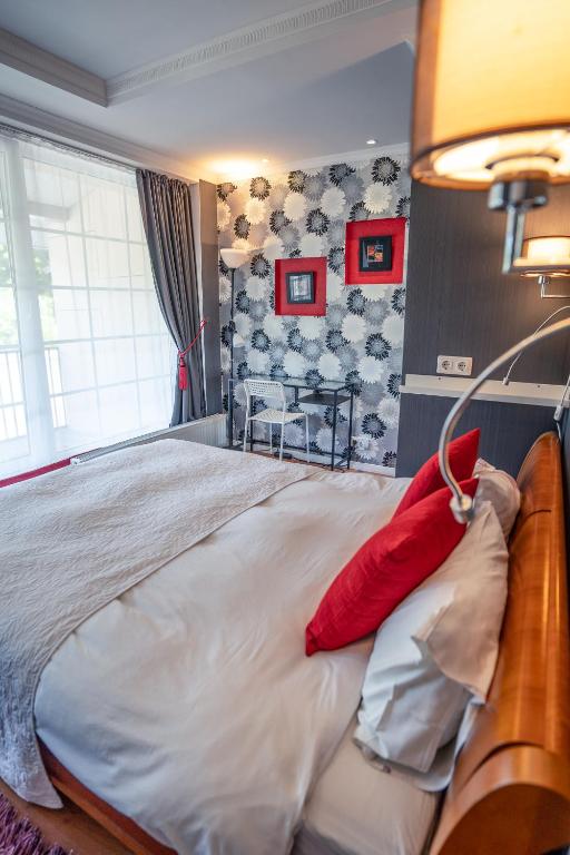 Postel nebo postele na pokoji v ubytování Alpetri Apartments
