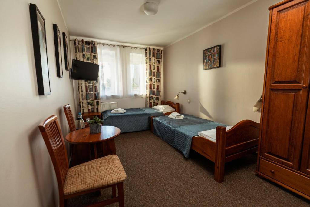Posteľ alebo postele v izbe v ubytovaní Villa Toscania-check in 24h