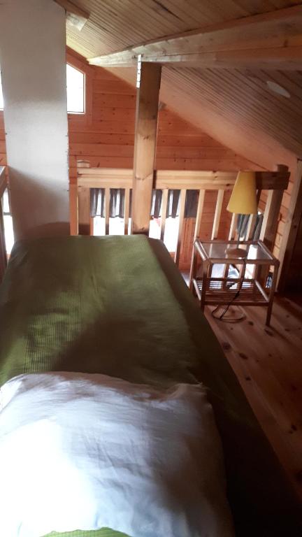 Postel nebo postele na pokoji v ubytování Savutaival