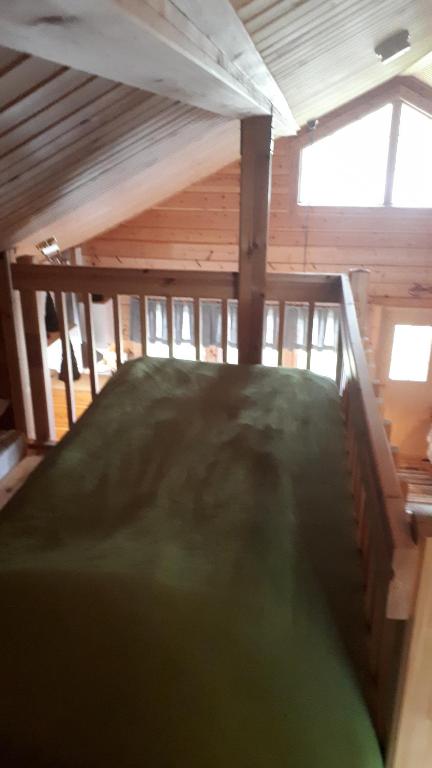 Postel nebo postele na pokoji v ubytování Savutaival
