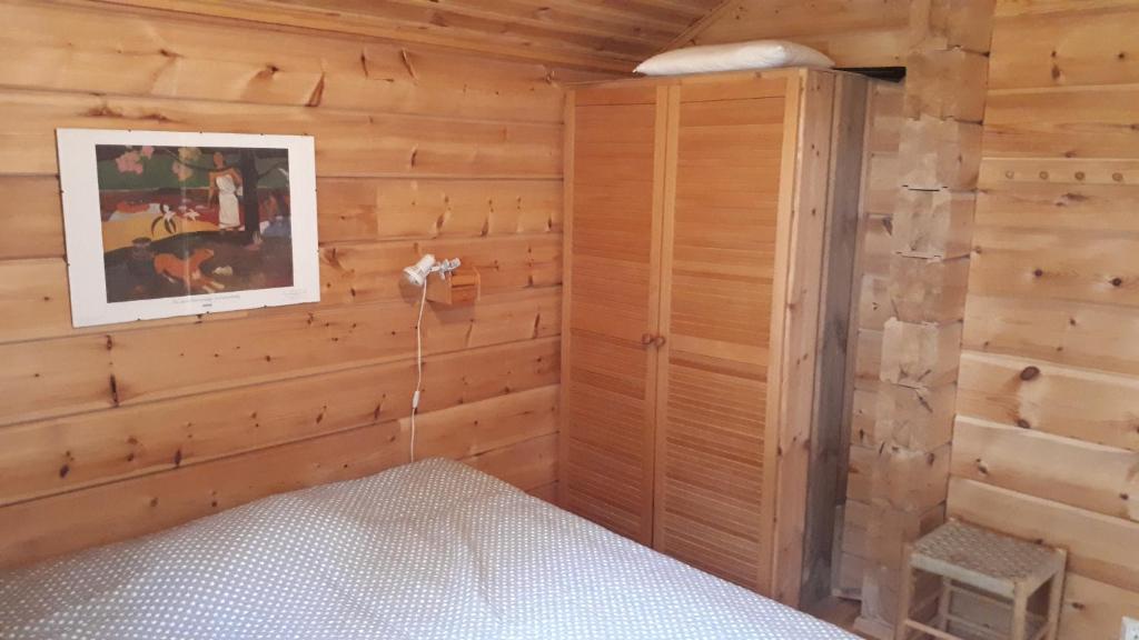 Postel nebo postele na pokoji v ubytování Savutaival