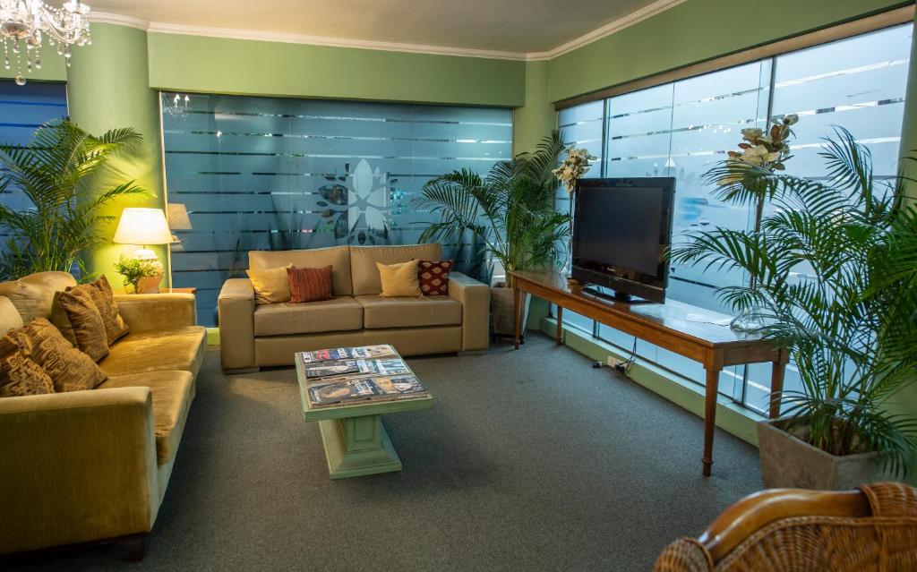 TV a/nebo společenská místnost v ubytování Hotel Cecilia