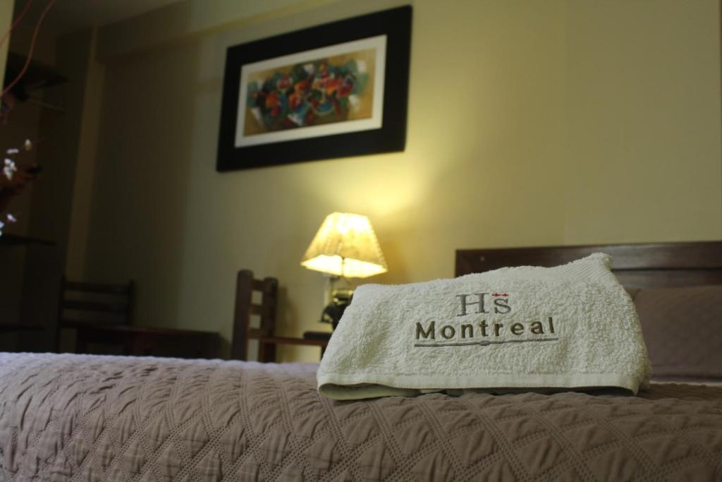 Letto o letti in una camera di Montreal Hostal