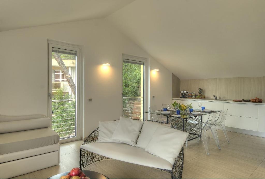 Posedenie v ubytovaní Residenza Ginepri 69