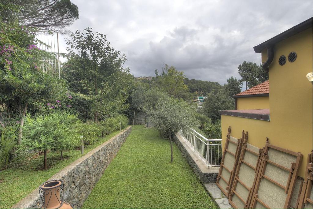 Vonkajšia záhrada v ubytovaní Residenza Ginepri 69