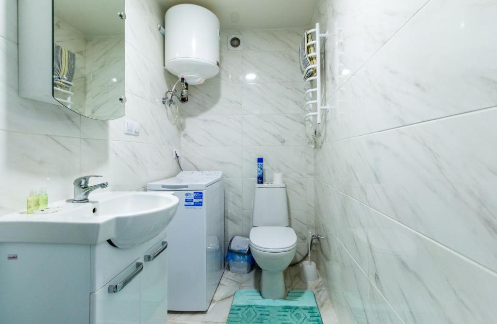 Koupelna v ubytování Home Inn
