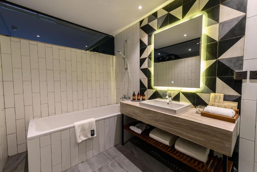 Koupelna v ubytování Baitong Hotel & Resort Phnom Penh