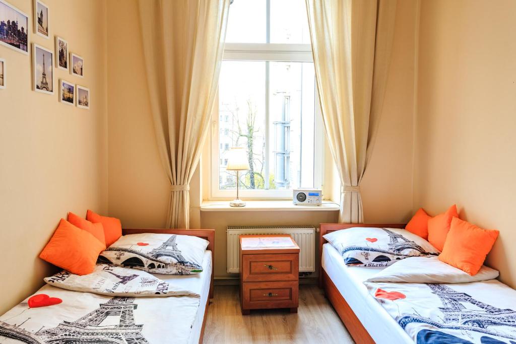 Uma cama ou camas num quarto em Babel Hostel, Dworzec PKP, Rynek