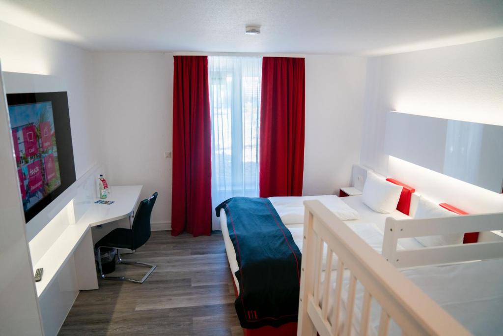 Postel nebo postele na pokoji v ubytování Hotel Andante Rust