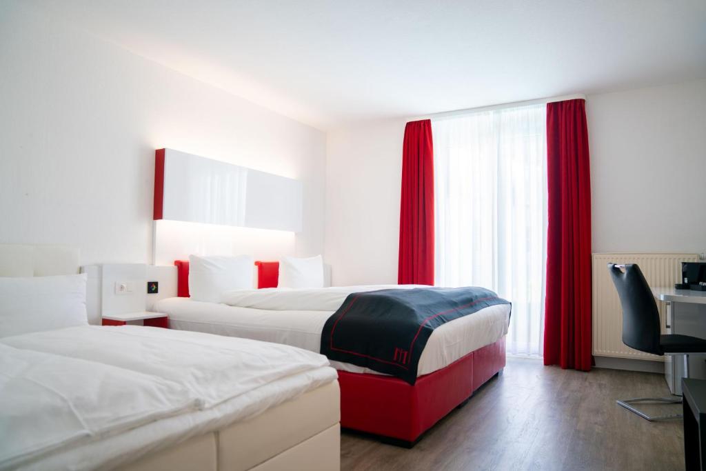 Postel nebo postele na pokoji v ubytování Hotel Andante Rust