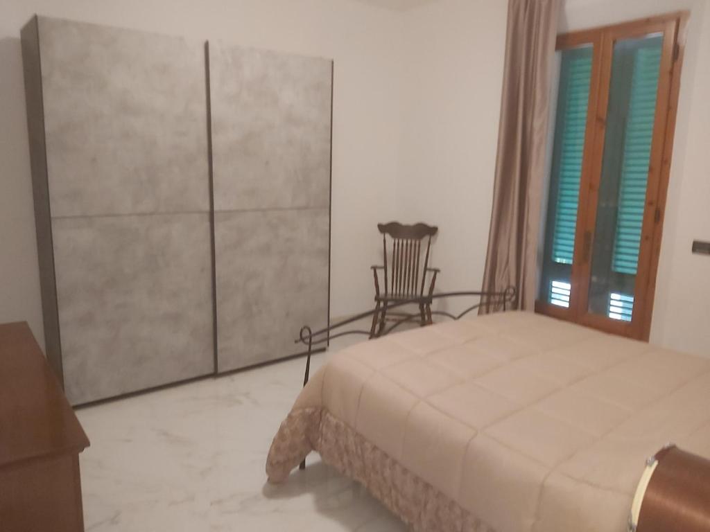 Postel nebo postele na pokoji v ubytování bel mare