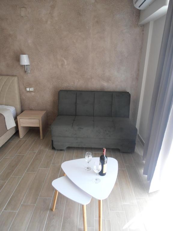 A seating area at Frosini Gardens