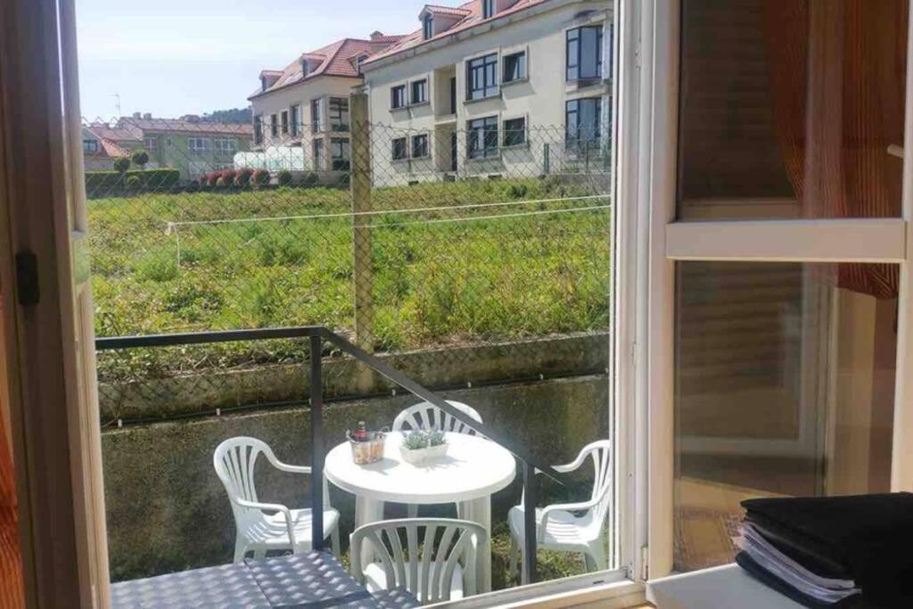 Balkón nebo terasa v ubytování Junto Camino De Santiago,1ª línea de playa