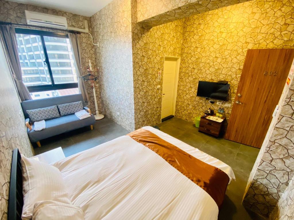 Postel nebo postele na pokoji v ubytování Yixiang Spring Travel