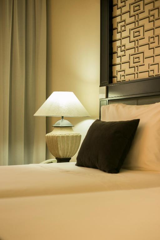 Ein Bett oder Betten in einem Zimmer der Unterkunft Hotel Mundial