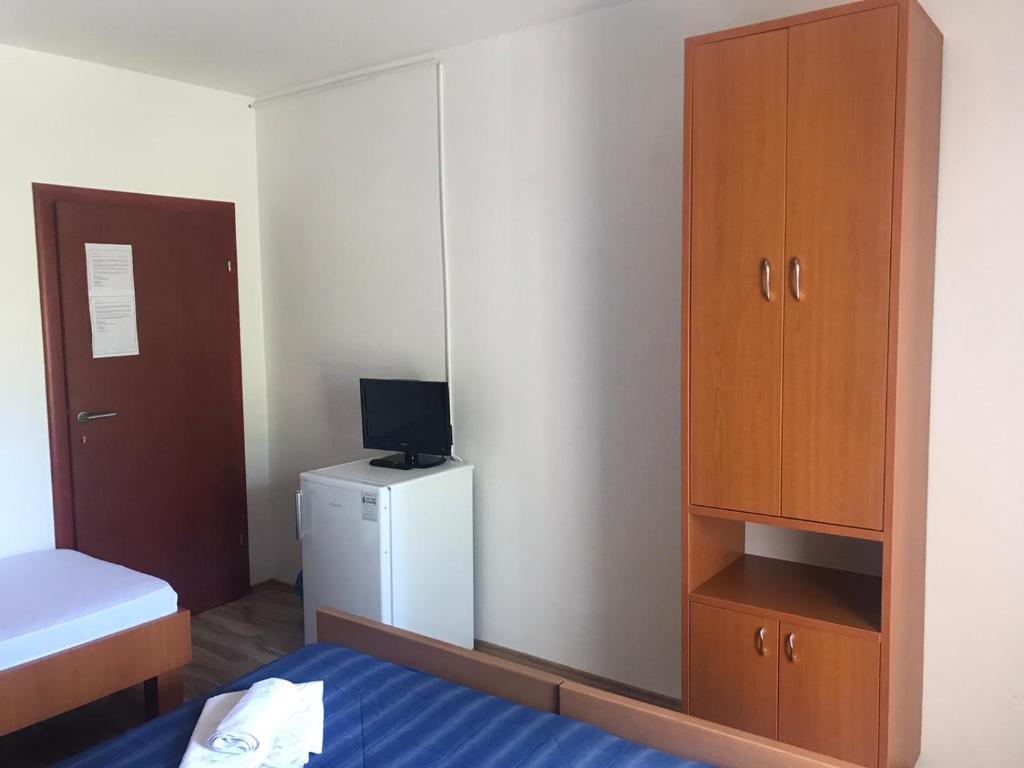Postel nebo postele na pokoji v ubytování Guesthouse Dupin