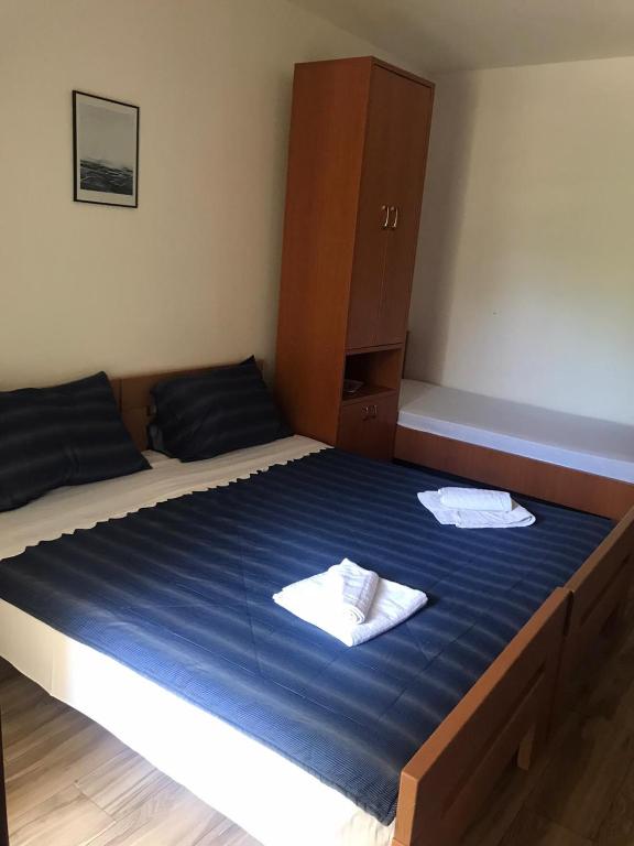 Postel nebo postele na pokoji v ubytování Guesthouse Dupin