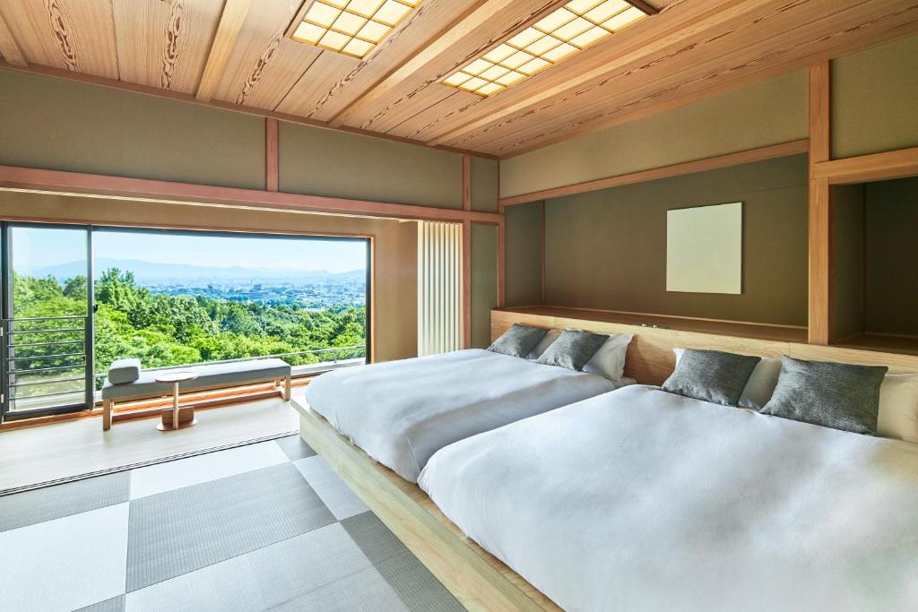 Postel nebo postele na pokoji v ubytování ANDO HOTEL NARA Wakakusayama -DLIGHT LIFE & HOTELS-