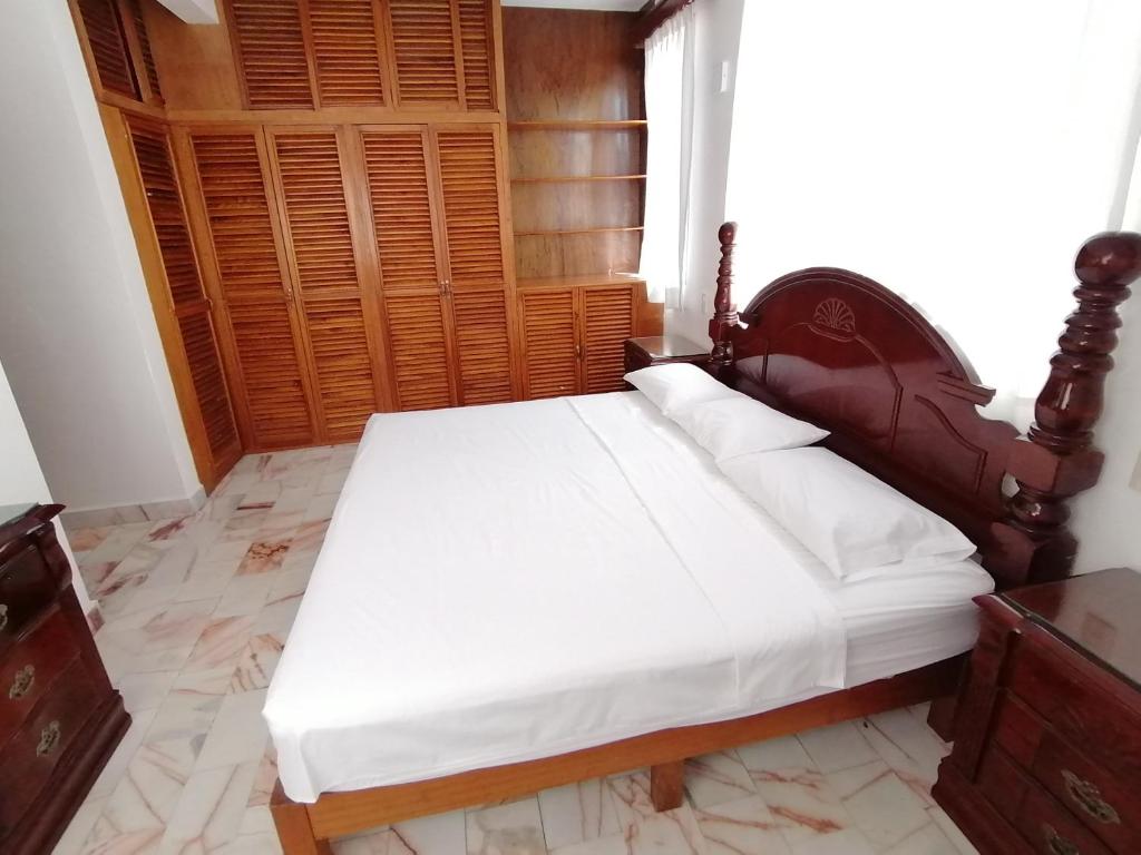 Postel nebo postele na pokoji v ubytování Don Luis Hostal - Sucursal Hidalgo - Tecolutla