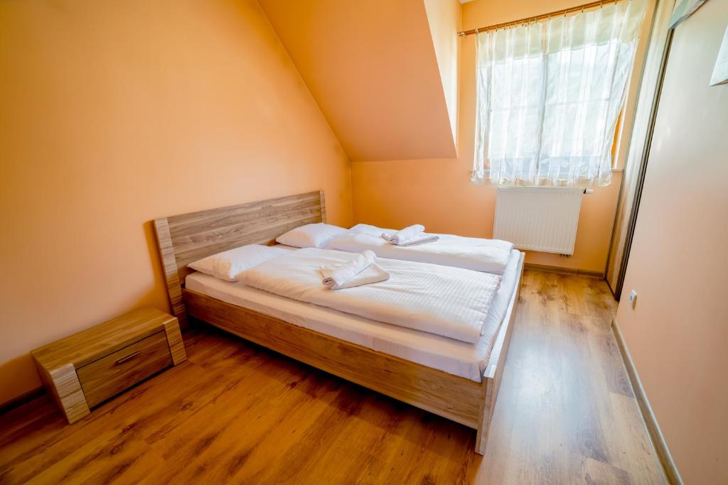 Posteľ alebo postele v izbe v ubytovaní Apartamenty Sun & Snow Karpacz Myśliwska