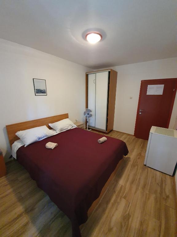 Postel nebo postele na pokoji v ubytování Guesthouse Dupin