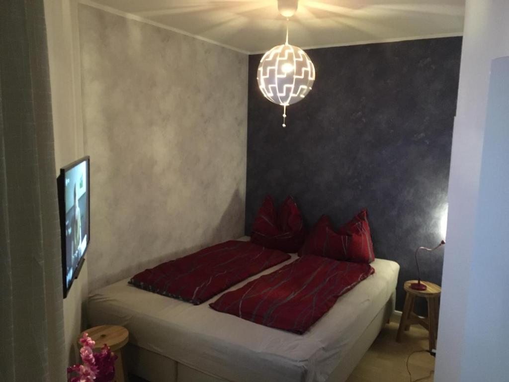 Postel nebo postele na pokoji v ubytování Mini-Ferien-Suite Hildesheim