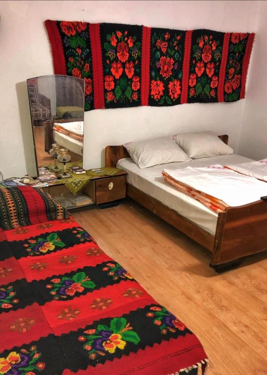 Postel nebo postele na pokoji v ubytování Etno Apartmani ''Vlaška kuća''