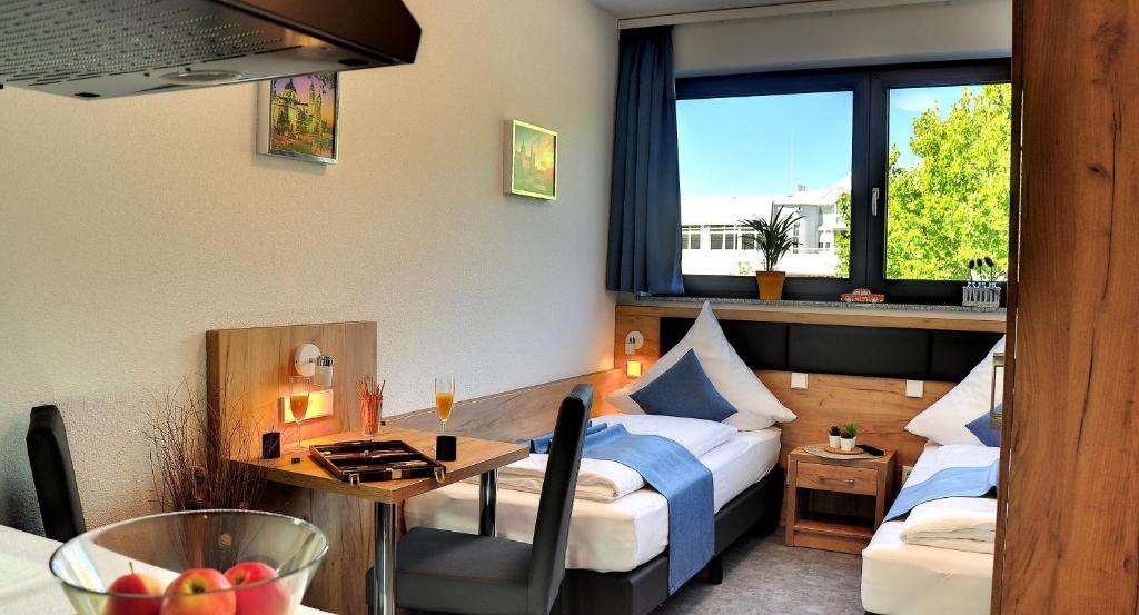 Postel nebo postele na pokoji v ubytování Motel am Fürfelder Schloss