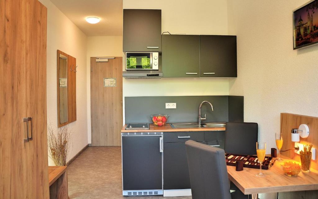 Kuchyň nebo kuchyňský kout v ubytování Motel am Fürfelder Schloss