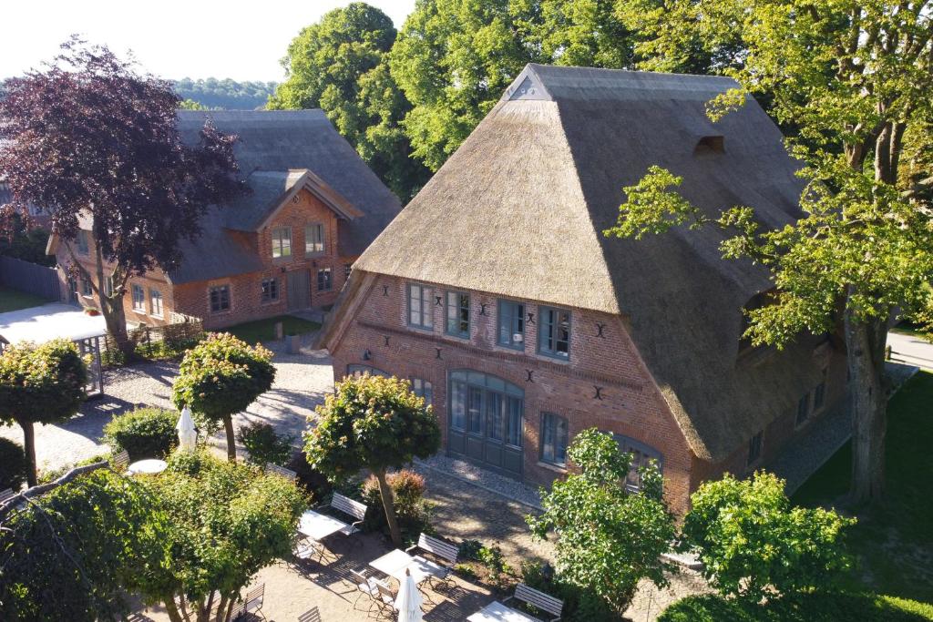 an aerial view of a large brick building with a roof at Antik-Hof Bissee in Bissee