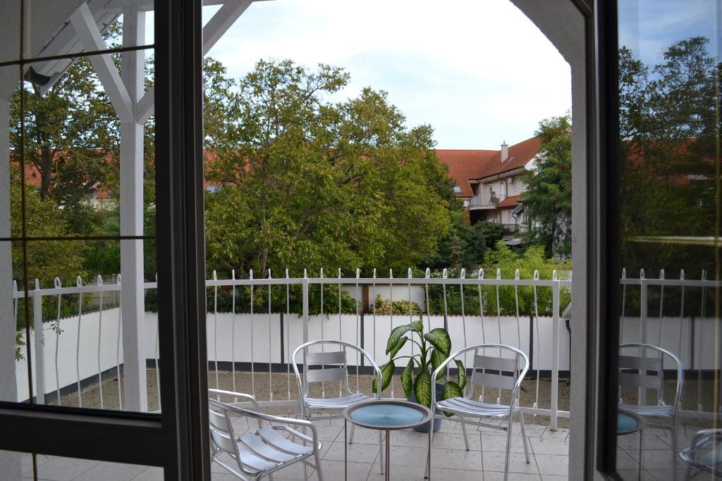 Balkón nebo terasa v ubytování Főnix Design Rooms