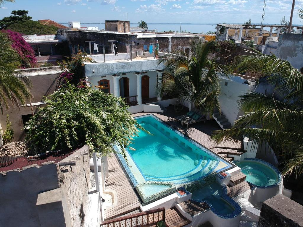 an overhead view of a swimming pool on a building at Cafe Central in Ilha de Moçambique