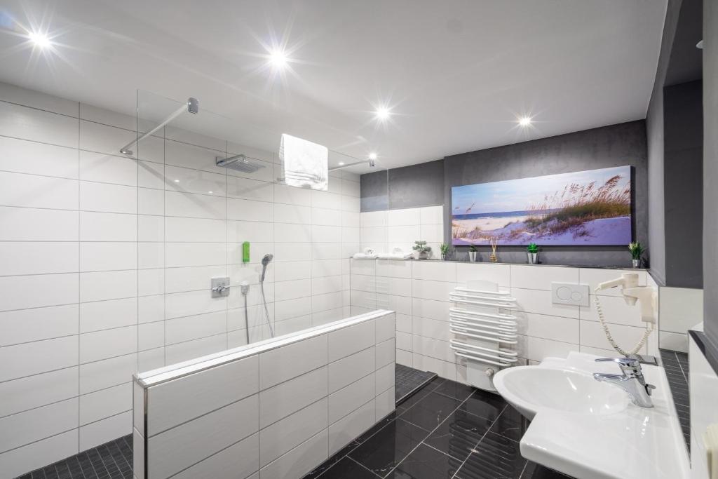 Koupelna v ubytování SL'otel im Parforcehaus