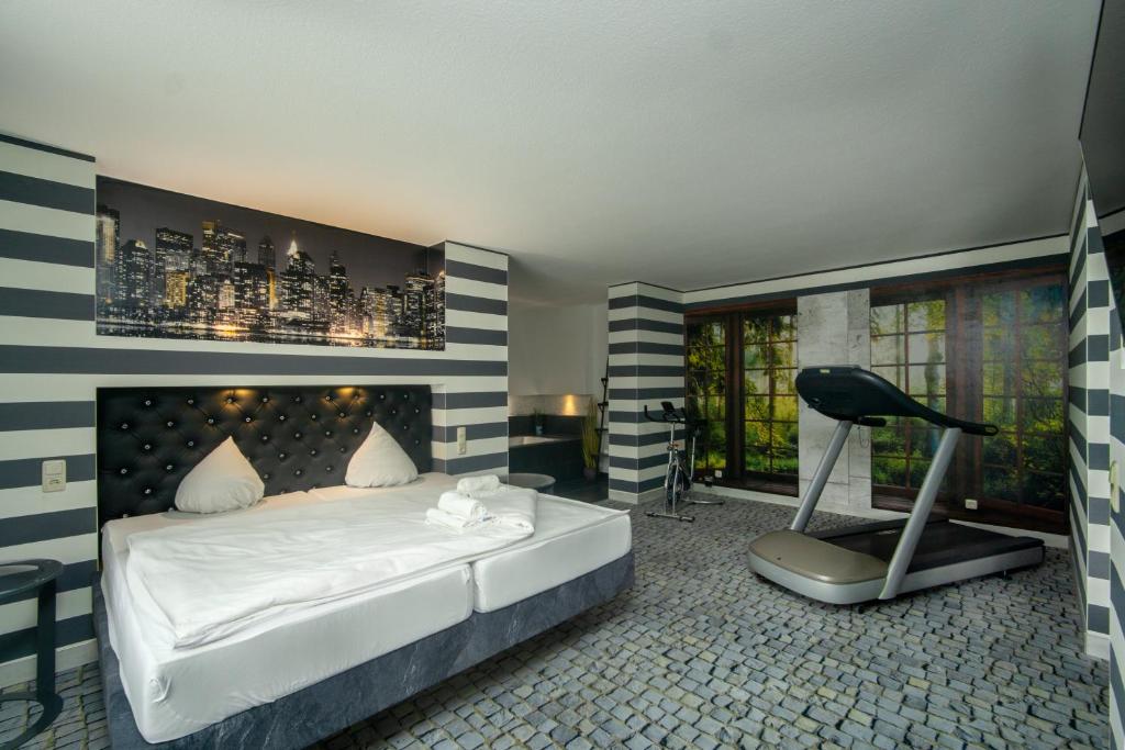 Postel nebo postele na pokoji v ubytování SL'otel im Parforcehaus