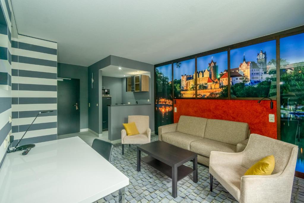 Posezení v ubytování SL'otel im Parforcehaus