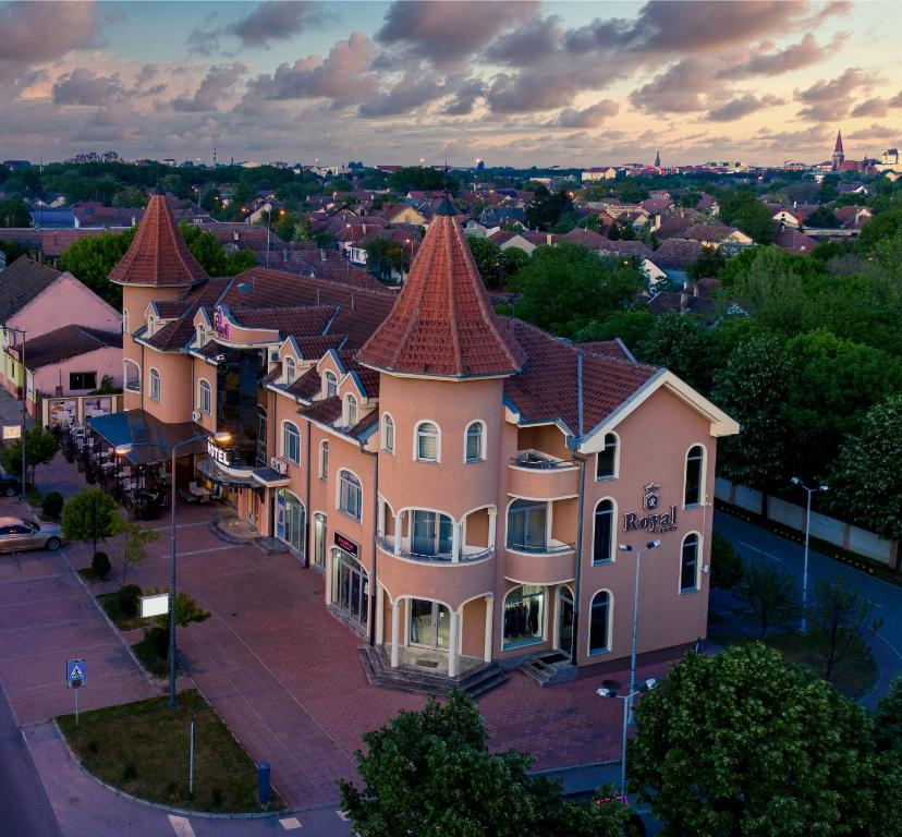arial view of a large house in a city at Garni Hotel Royal Crown in Subotica