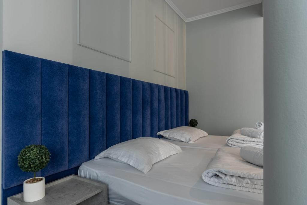 Postel nebo postele na pokoji v ubytování Hotel PASO