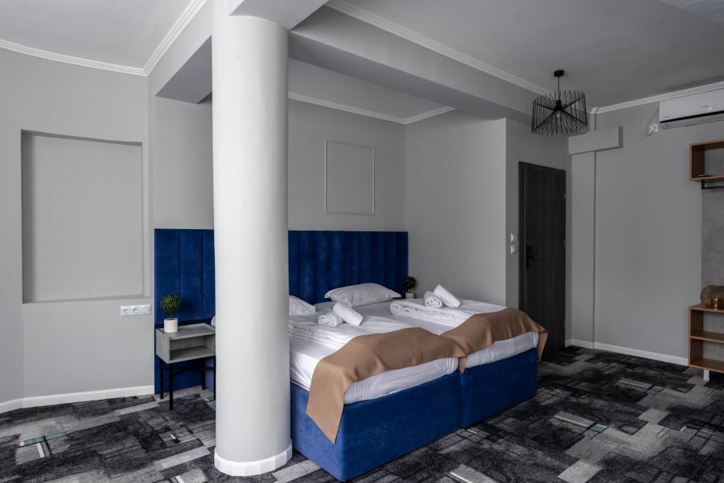 Postel nebo postele na pokoji v ubytování Hotel PASO