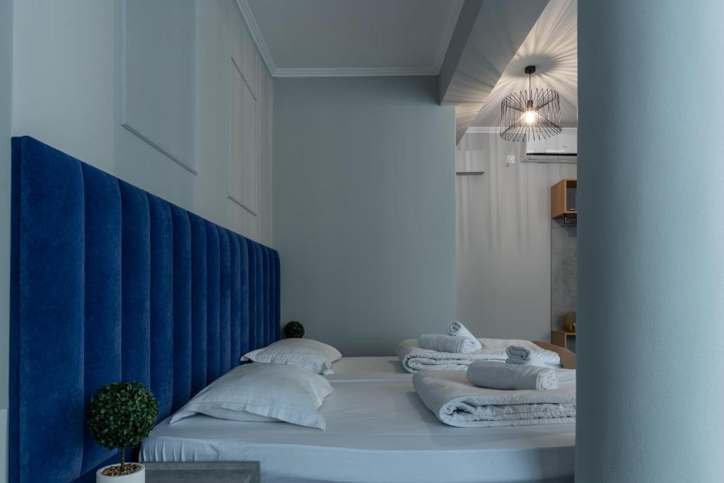 Postel nebo postele na pokoji v ubytování Hotel PASO