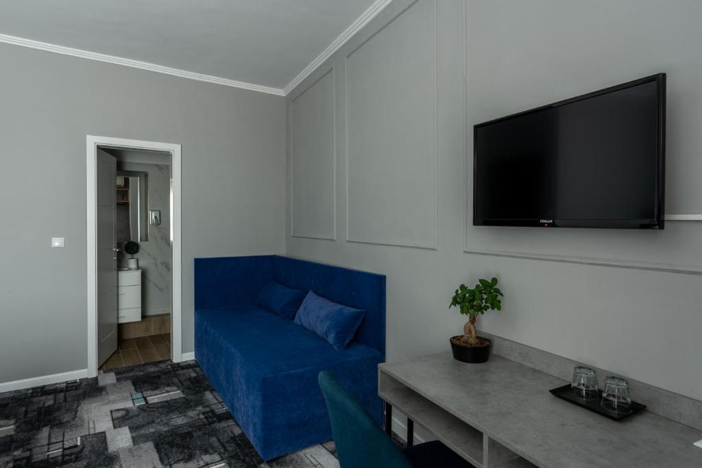 TV a/nebo společenská místnost v ubytování Hotel PASO