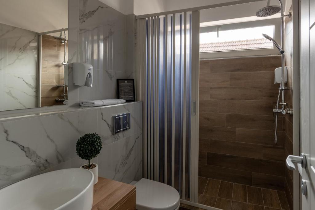 Koupelna v ubytování Hotel PASO