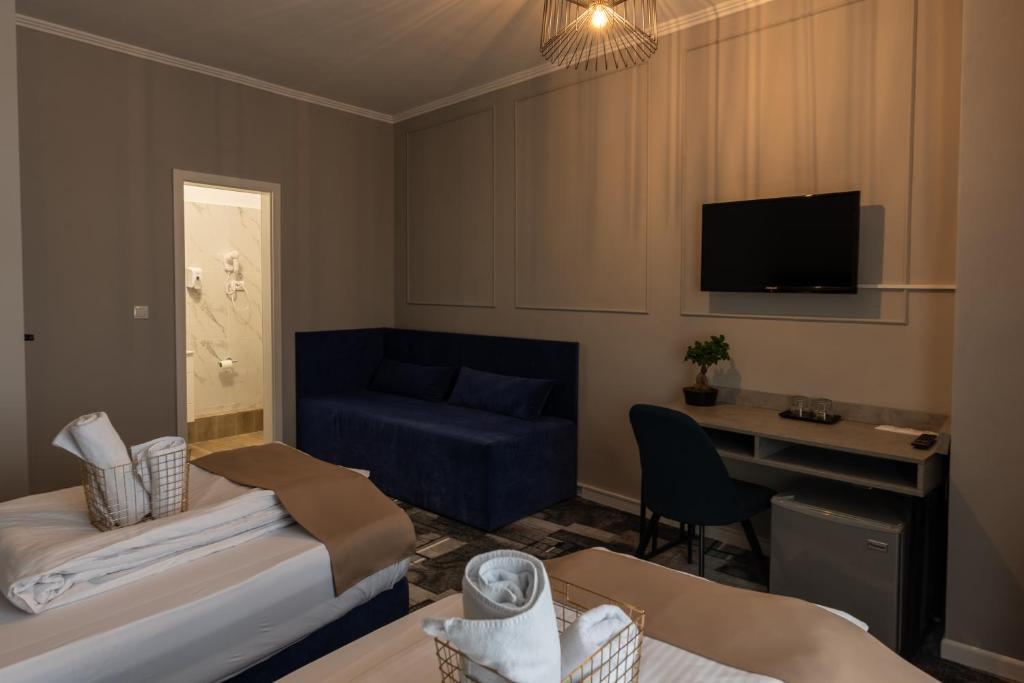 Postel nebo postele na pokoji v ubytování Hotel PASO