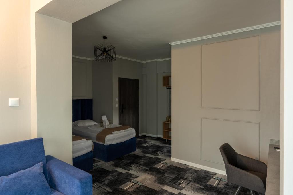 Postel nebo postele na pokoji v ubytování Hotel PASO