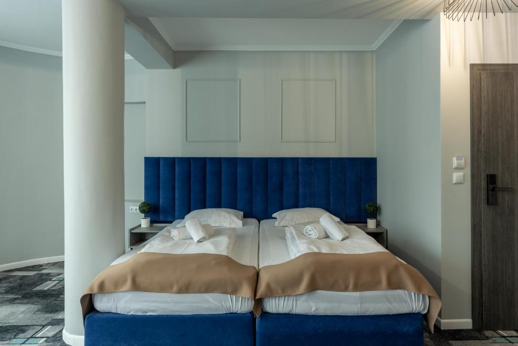 Postel nebo postele na pokoji v ubytování Hotel PASO