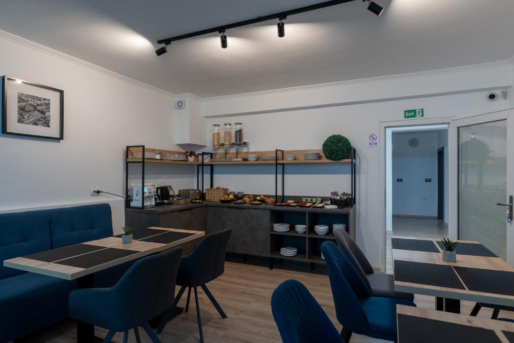 Posezení v ubytování Hotel PASO