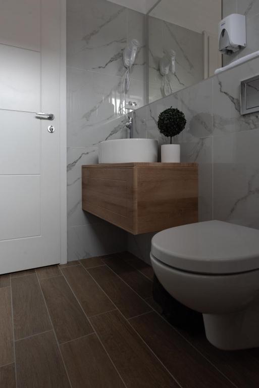 Koupelna v ubytování Hotel PASO