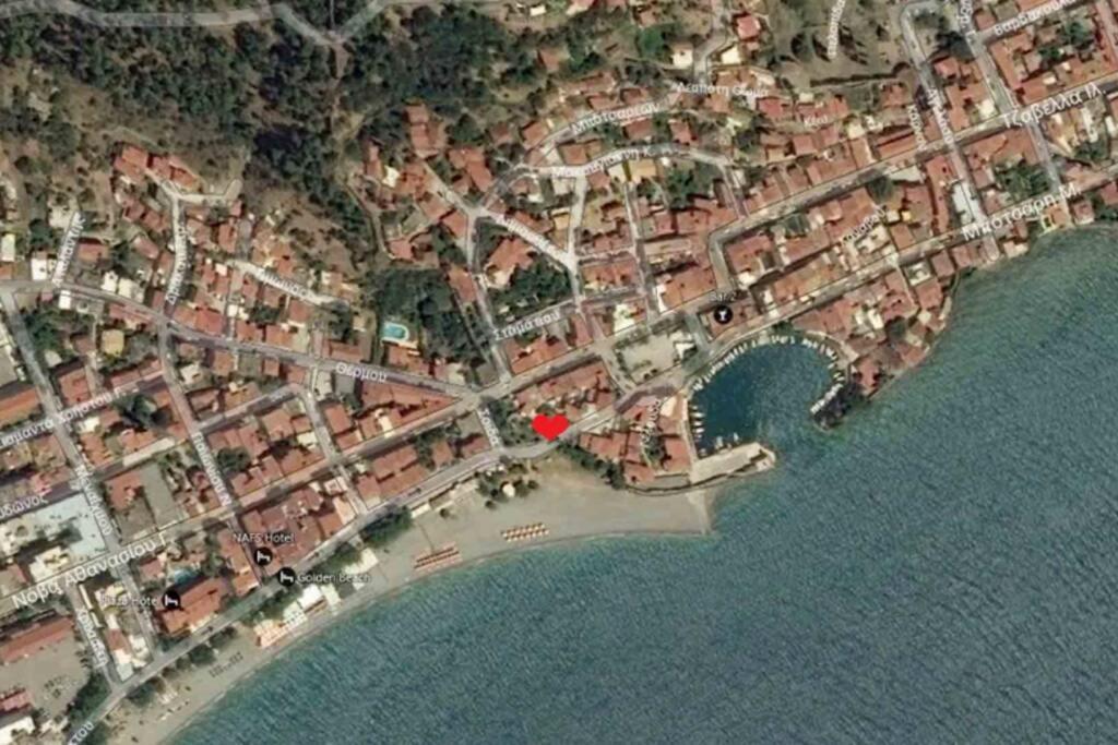 an overhead view of a city next to the water at Naupactus unique harbor apartment in a stone house! in Nafpaktos