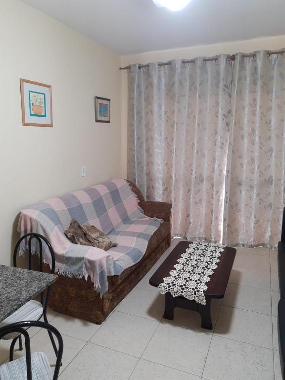  Pé na Areia