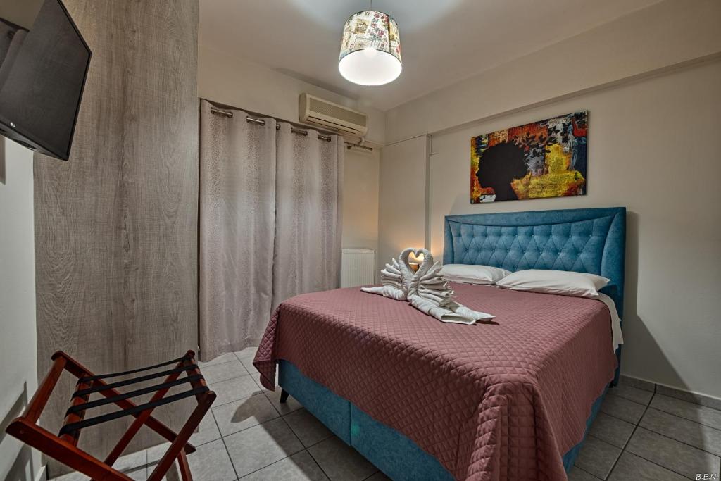 Posteľ alebo postele v izbe v ubytovaní Alexia's Apartments