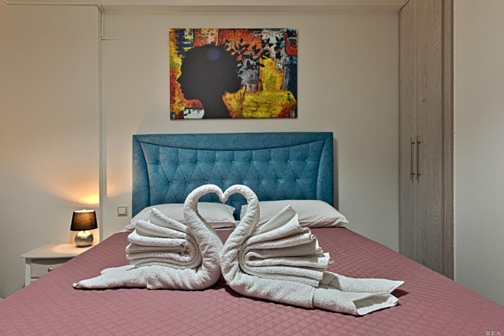 Posteľ alebo postele v izbe v ubytovaní Alexia's Apartments